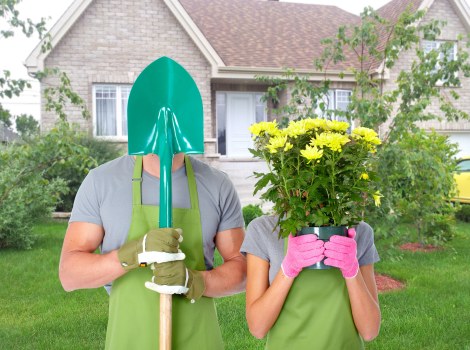 Team of gardeners carrying out pruning and hedge trimming